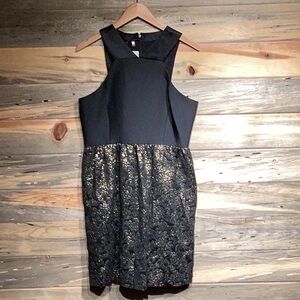 4. Collective dress never been worn, black and gold with tags.